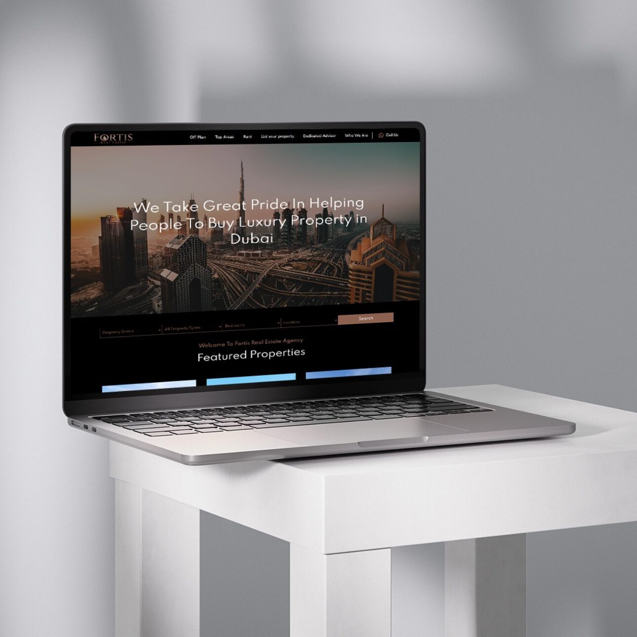 Fortis Real Estate website shown on a screen