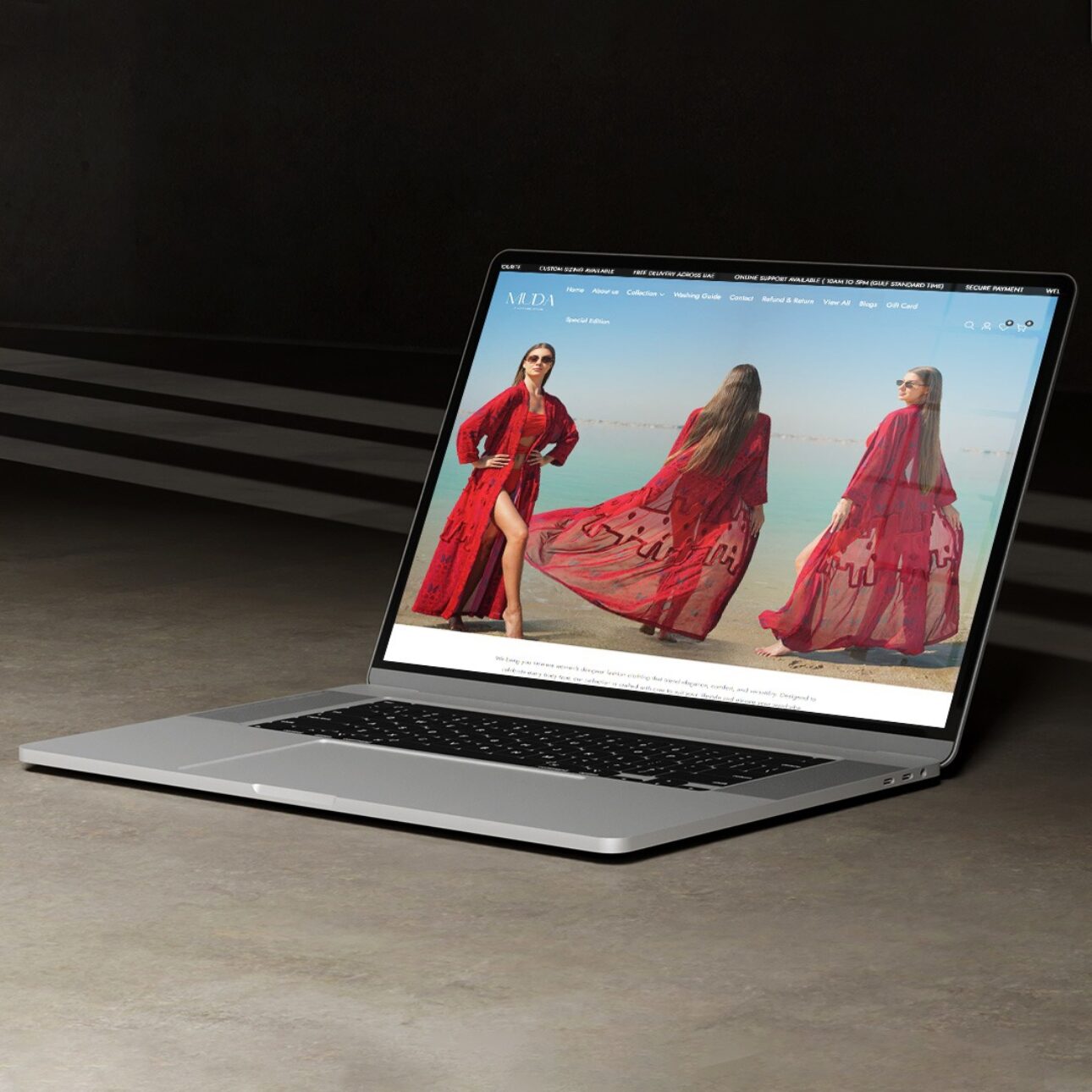 Muda Clothing website shown on a screen